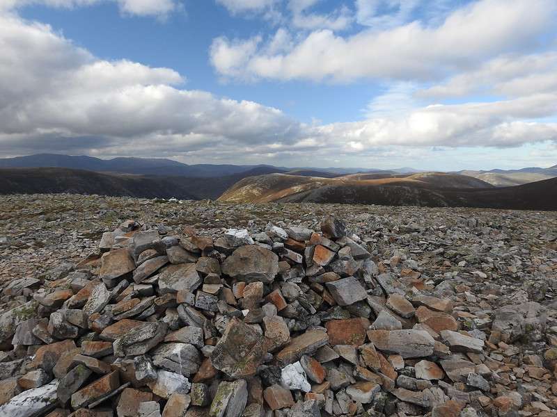 Another stony summit. A small cairn for shelter if you need it.
