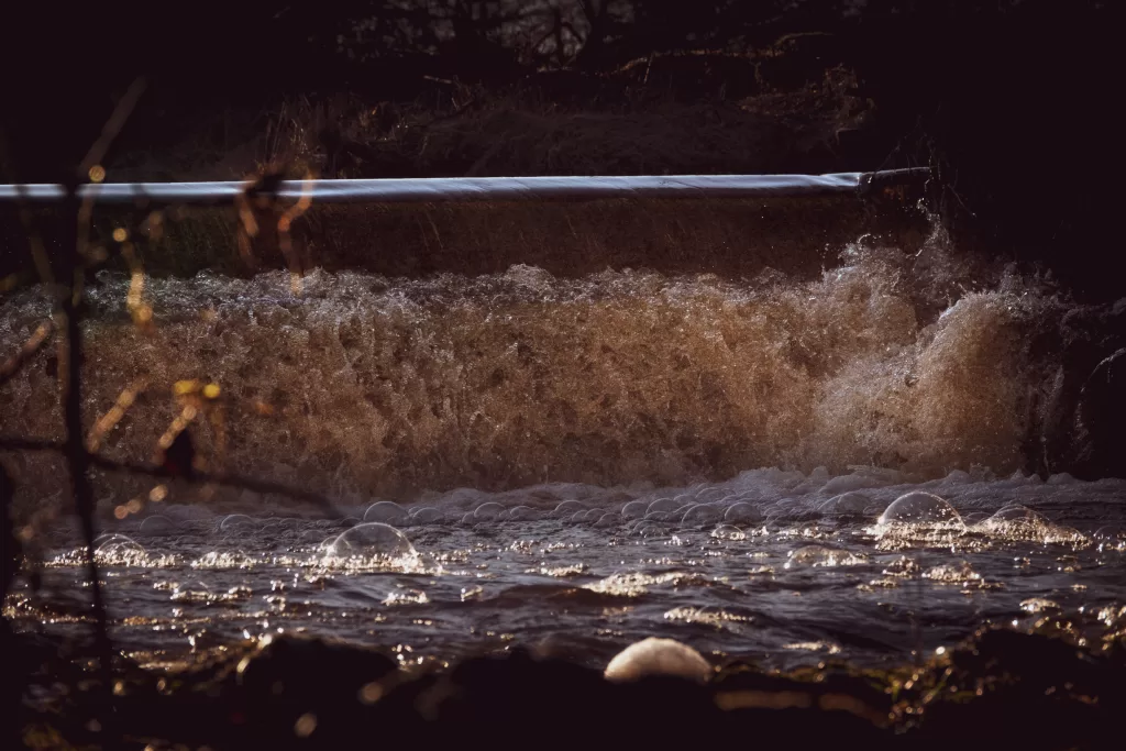 Water raging over the weir at Linn Jaw Waterfall